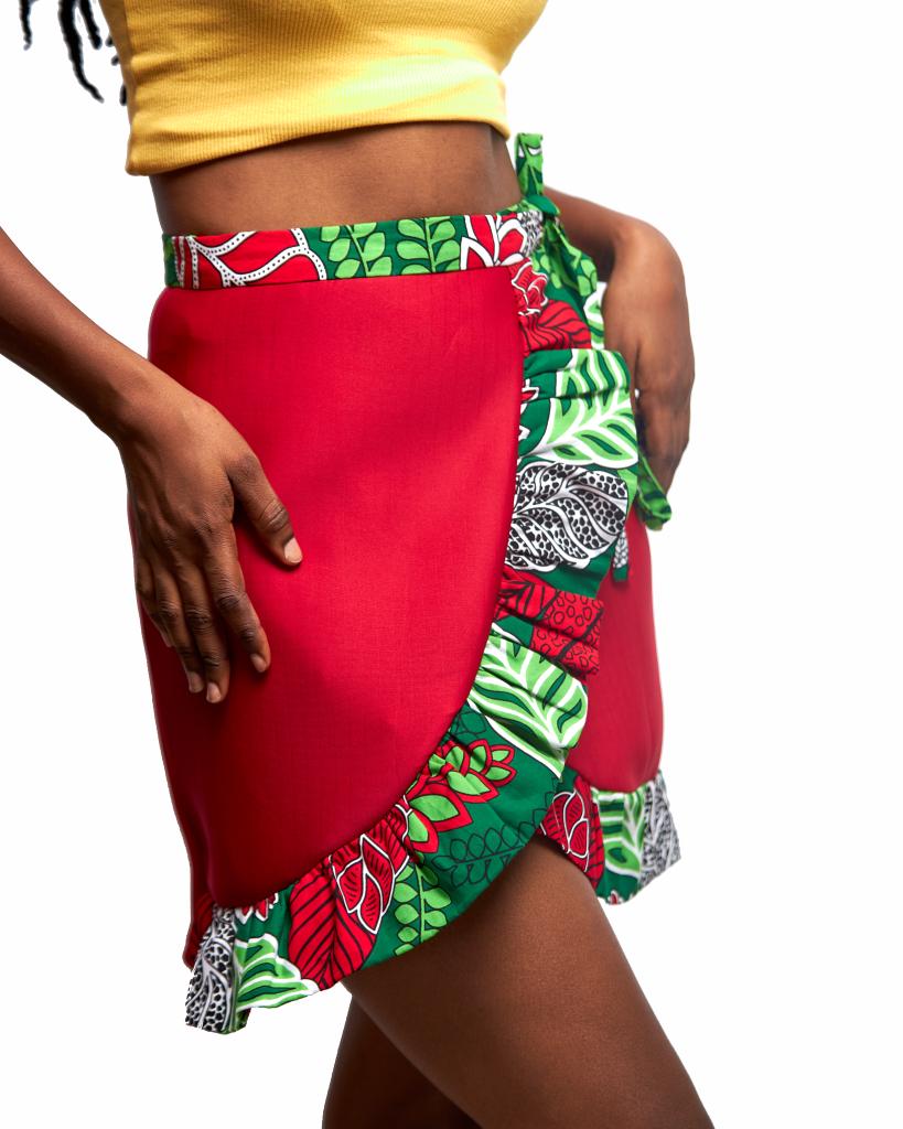 Sexy red wrap mini skirt made from a combination of red scuba and a green,red,white ankara fabric.
