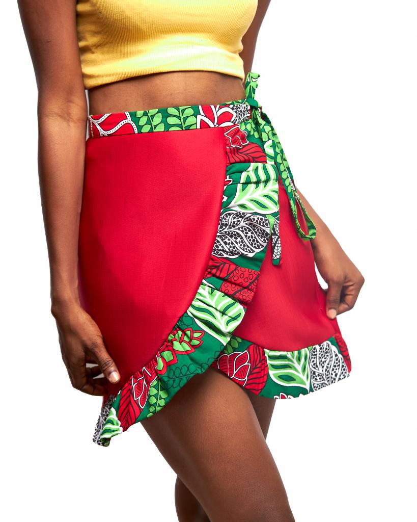 Sexy red wrap mini skirt made from a combination of red scuba and a green,red,white ankara fabric.