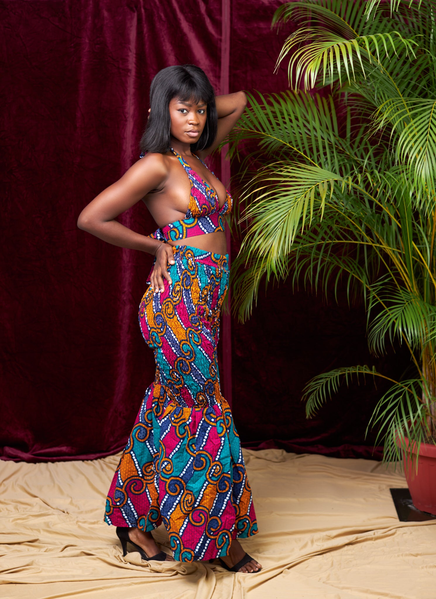 A blend of Blue, Red And Orange Ankara Print Stretchy Tube Back Tie Top With it Matching Stretchy Palazo Pant African Style