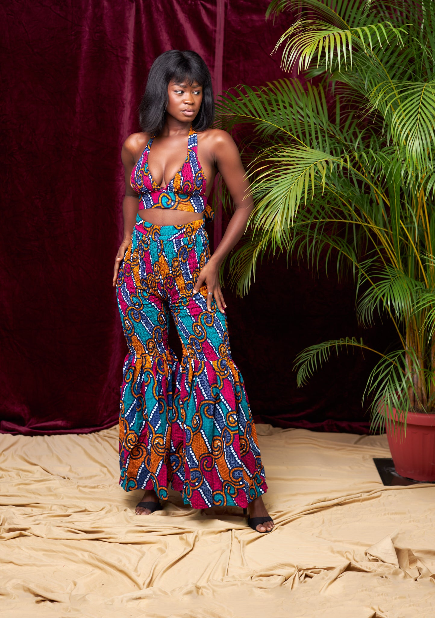 A blend of Blue, Red And Orange Ankara Print Stretchy Tube Back Tie Top With it Matching Stretchy Palazo Pant African Style
