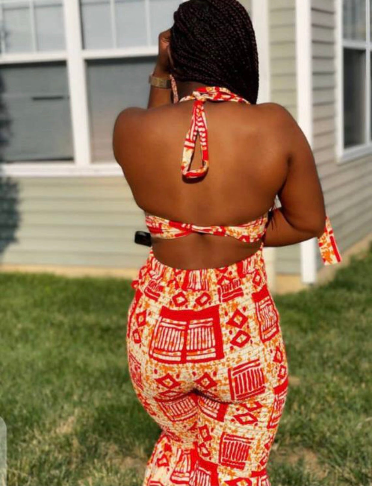 A blend of Red And Cream Ankara Print Stretchy Tube Back Tie Top With it Matching Stretchy Palazo Pant African Style