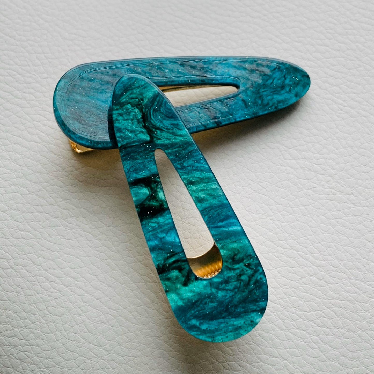2 Piece Turquoise Green And Black No Slip Grip Curved Oval Hair Clip