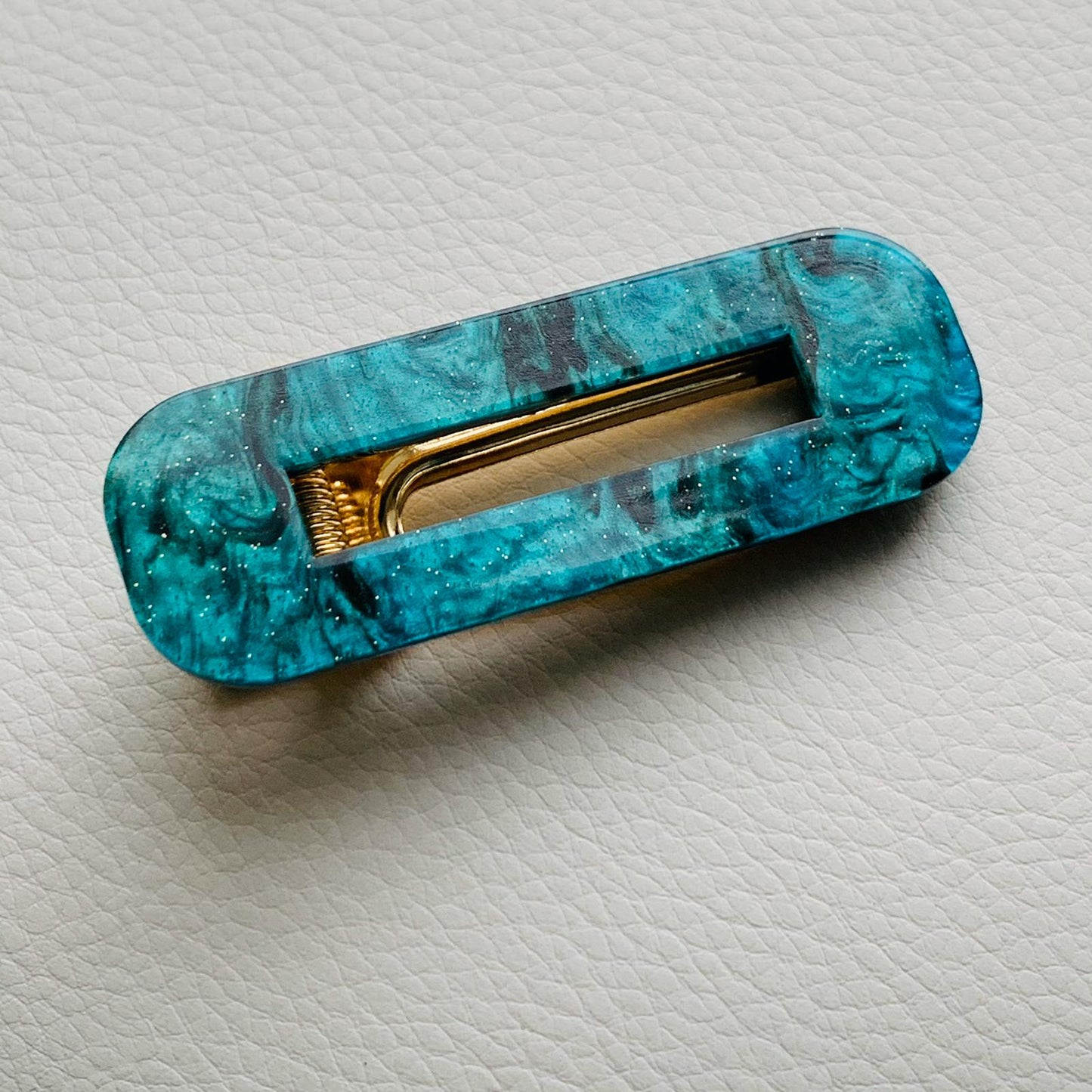 1 Turquoise Green And Black No Slip Grip Curved Rectangle Hair Clip