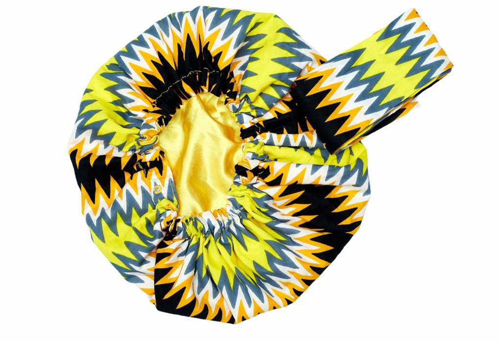 Ghanaian Kente Wax Print Made of Yellow, Gold ,Ash ,Black and White Blended Beautiful Colours And Pattern, Hand Made Elastic Silklined Bonnet With Band