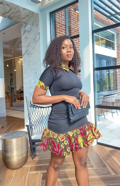 Solid Black Color With A Spread Short Sleeve Mid Dress. Spread Collar, Sleeve Edge And Dress Edges Made Of Yellow, Black And Wine Pattern Ankara Wax Print