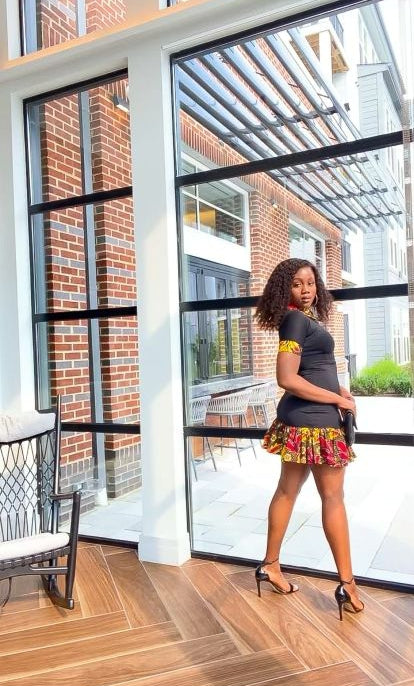 Solid Black Color With A Spread Short Sleeve Mid Dress. Spread Collar, Sleeve Edge And Dress Edges Made Of Yellow, Black And Wine Pattern Ankara Wax Print