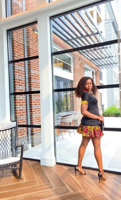 Solid Black Color With A Spread Short Sleeve Mid Dress. Spread Collar, Sleeve Edge And Dress Edges Made Of Yellow, Black And Wine Pattern Ankara Wax Print