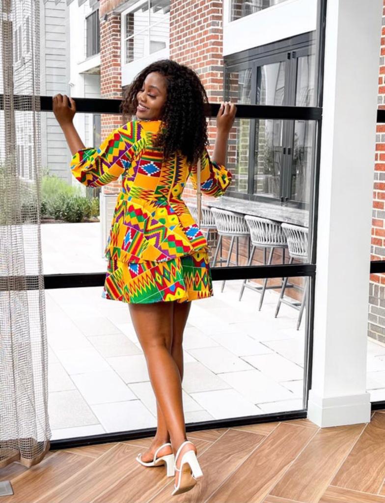 A Blend Of Yellow, Red, Purple, Blue And Green Kente Print V Neck Mid Puff Sleeve double Layered Midi Dress