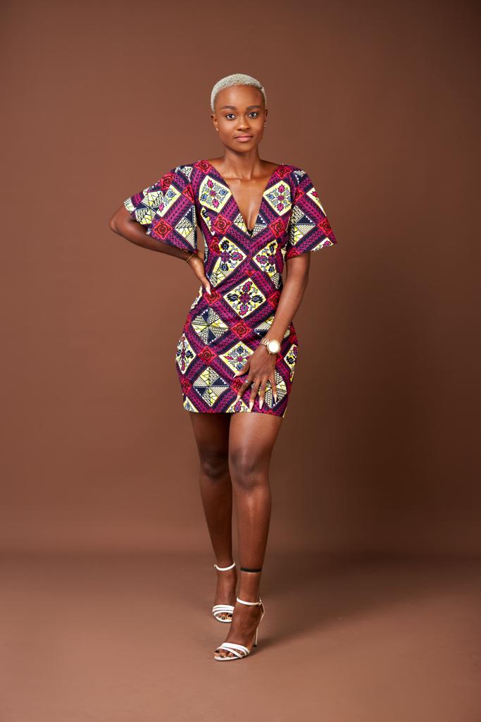 A Blend of Blue, Purple , Red And Black Ankara Wax Print Short Sleeve V Neck Back Zip Fitting Mini Dress