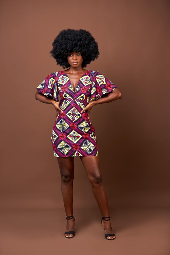 A Blend of Blue, Purple , Red And Black Ankara Wax Print Short Sleeve V Neck Back Zip Fitting Mini Dress