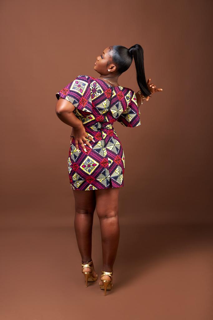 A Blend of Blue, Purple , Red And Black Ankara Wax Print Short Sleeve V Neck Back Zip Fitting Mini Dress