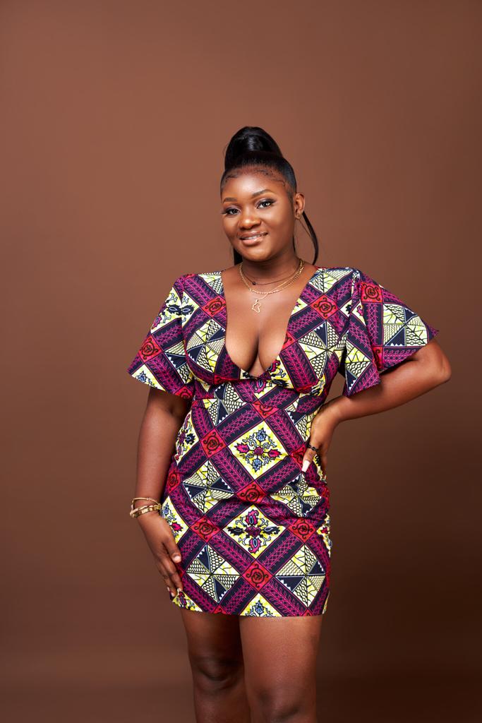 A Blend of Blue, Purple , Red And Black Ankara Wax Print Short Sleeve V Neck Back Zip Fitting Mini Dress