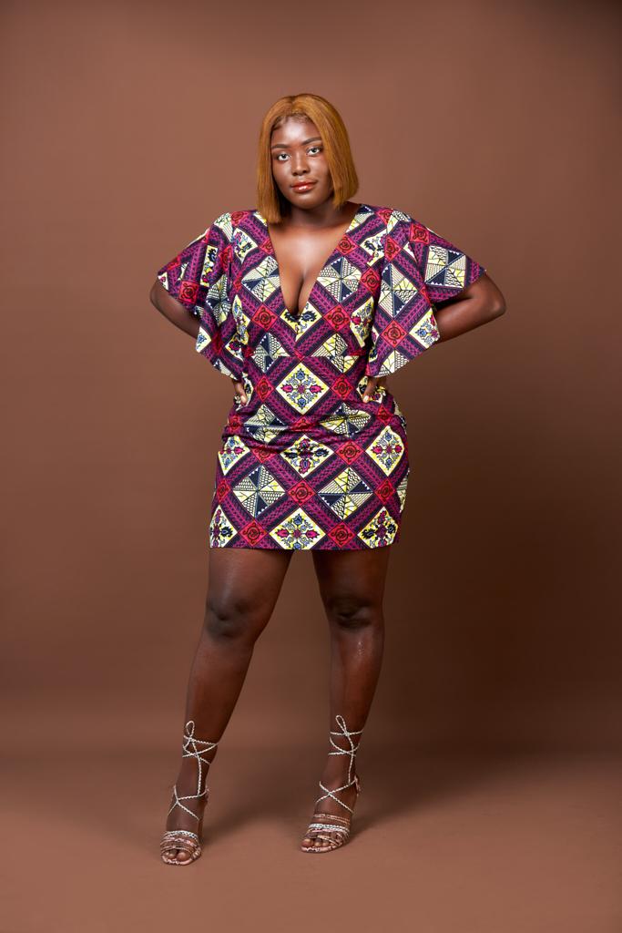 A Blend of Blue, Purple , Red And Black Ankara Wax Print Short Sleeve V Neck Back Zip Fitting Mini Dress