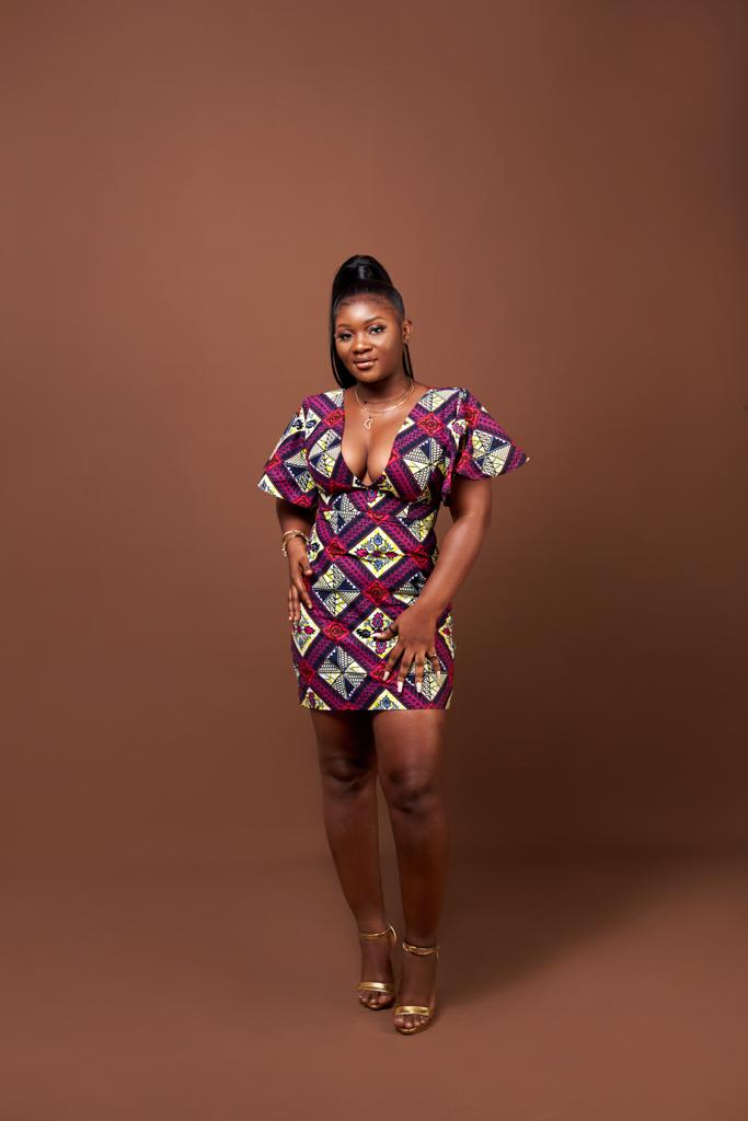 A Blend of Blue, Purple, Red And Black Ankara Wax Print Short Sleeve V Neck Back Zip Fitting Mini Dress