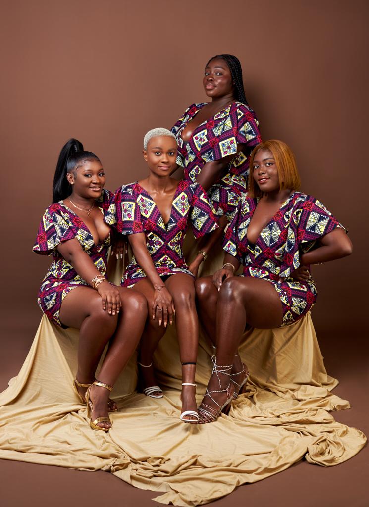 A Blend of Blue, Purple, Red And Black Ankara Wax Print Short Sleeve V Neck Back Zip Fitting Mini Dress