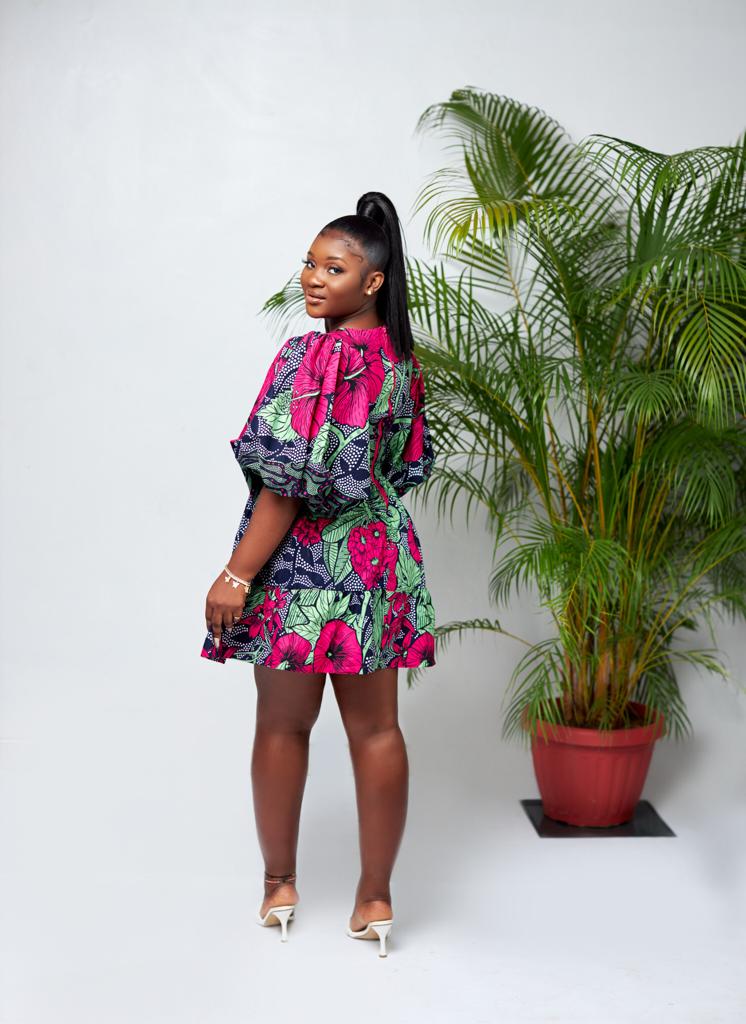 A blend of Green, Black, Blue And Pink Puff Mid Sleeve Ankara Print Mini Dress