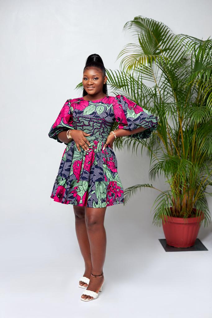 A blend of Green, Black, Blue And Pink Puff Mid Sleeve Ankara Print Mini Dress