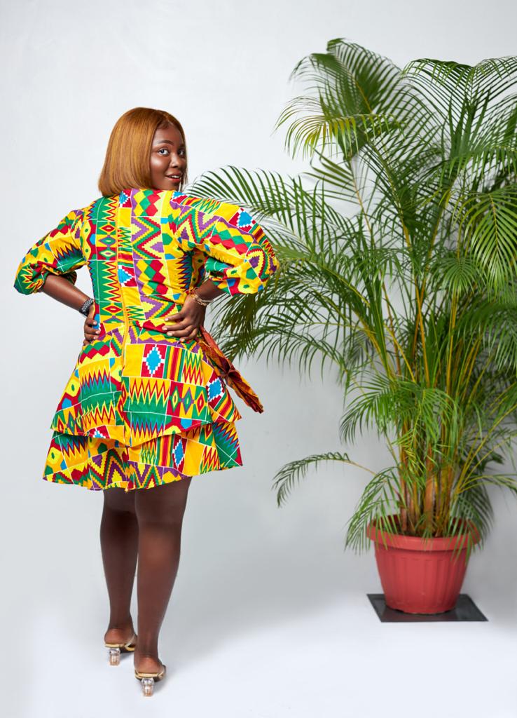A Blend Of Yellow, Red, Purple, Blue And Green Kente Print V Neck Mid Puff Sleeve double Layered Midi Dress