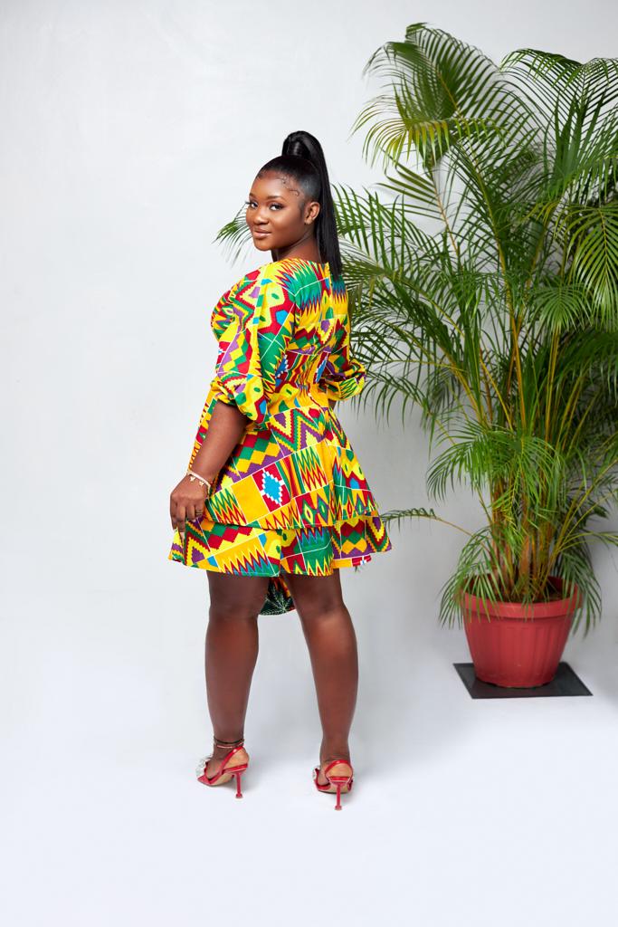 A Blend Of Yellow, Red, Purple, Blue And Green Kente Print V Neck Mid Puff Sleeve double Layered Midi Dress