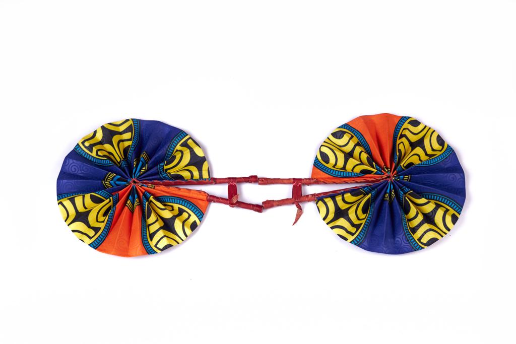 Foldable and Portable Bogolan Print Made of Orange, Yellow,Black And Blue Well Designed Colours Ghana Made Handfans With Leather Handle.