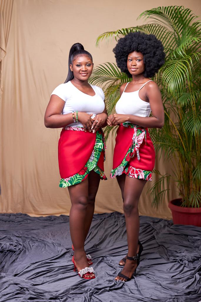 Sexy red wrap mini skirt made from a combination of red scuba and a green,red,white ankara fabric.