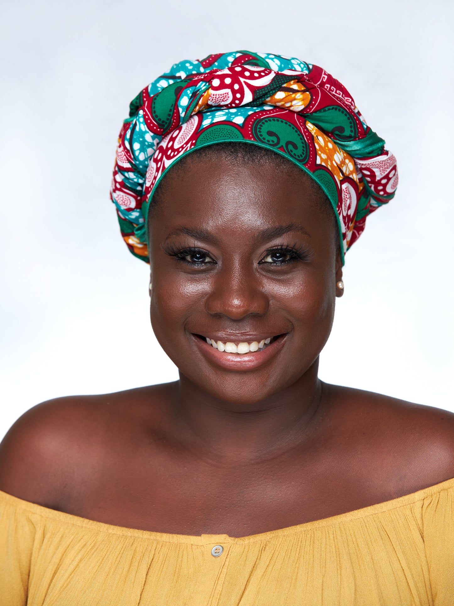 Ankara Cotton wax Print Made of Red, Orange,Green White,abd Seablue Colours Beautifully Arranged Detachable Silklined Headwrap