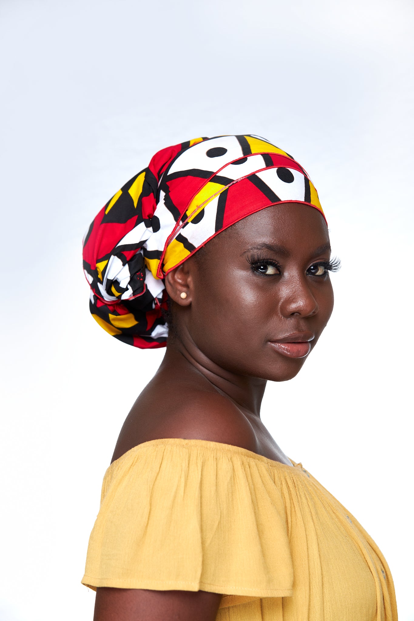 Beautiful Bogolan High Quality Cotton Print Fabric,Red,White, Yellow Black Coloured with Sketched Shape Imprint Designed Detachable Silklined Headwrap