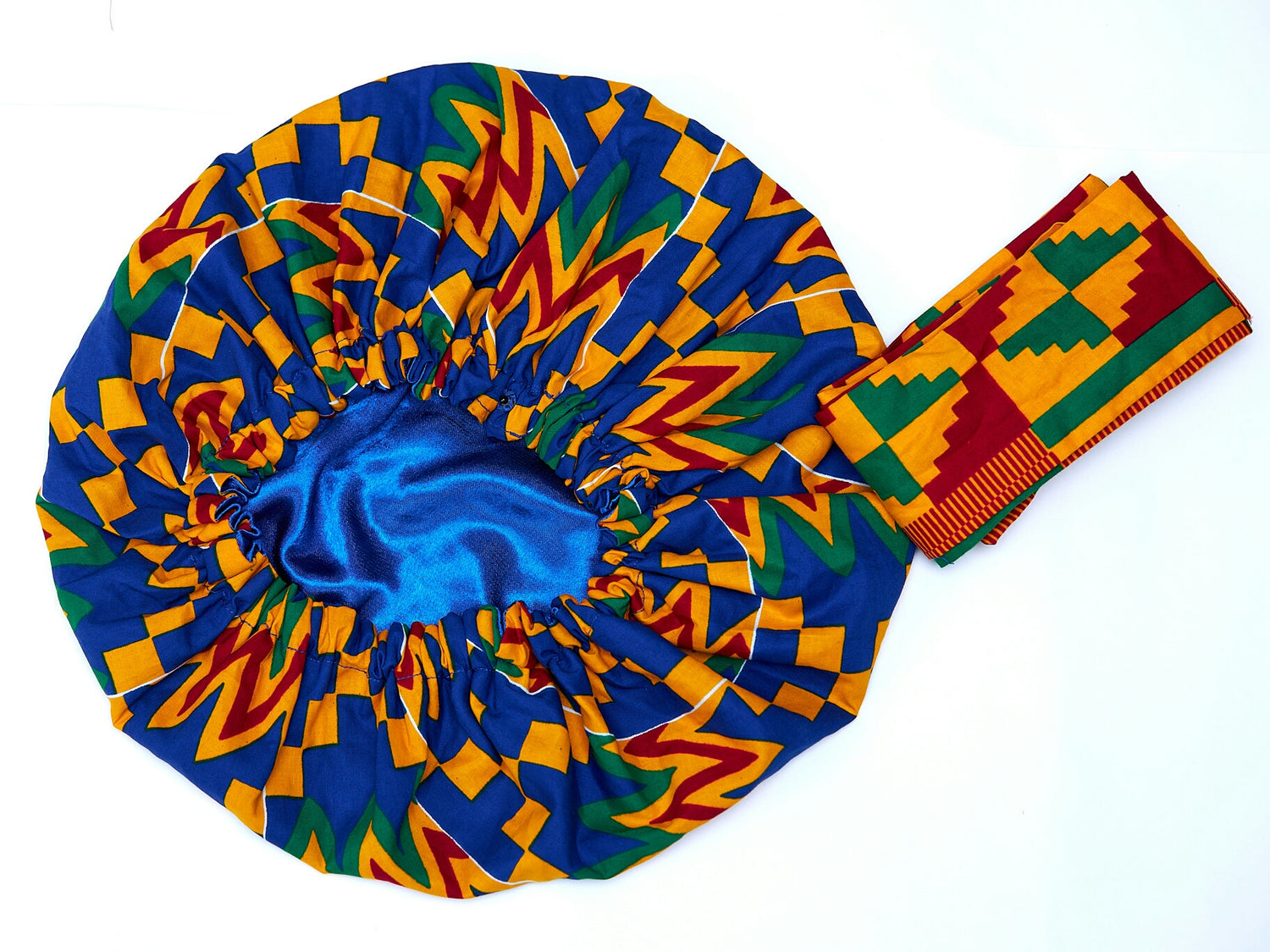 A Ghanaian Wax Print Made of Blue, Green, Red and White Blended Beautiful Colours And Pattern, Hand Made Elastic Silklined Bonnet With Band