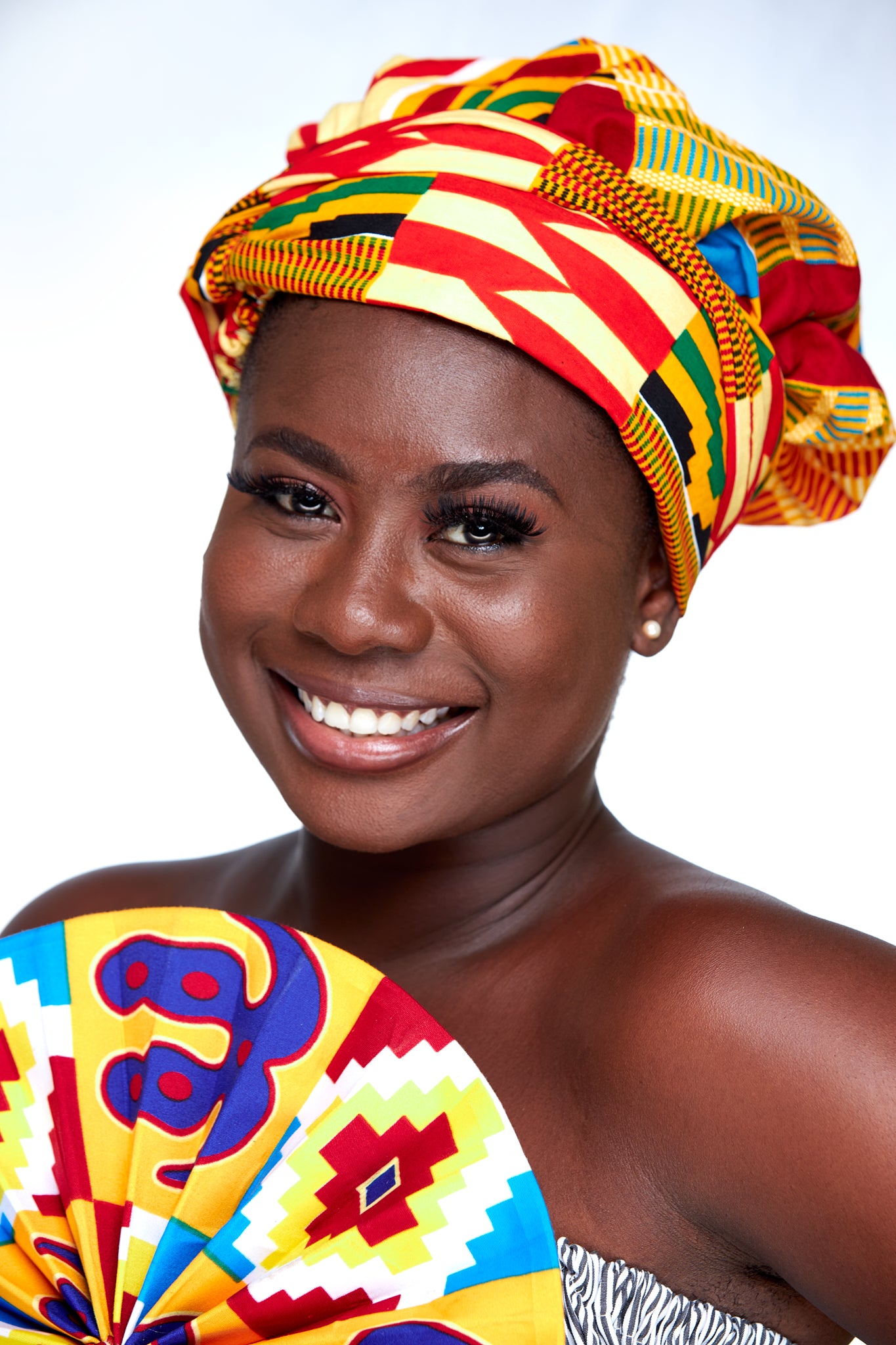 Ghanaian Kente Print Made of Pink, yellow, Black and Gold Blended Beautiful Colours, Hand Made Elastic Silklined Bonnet With Band