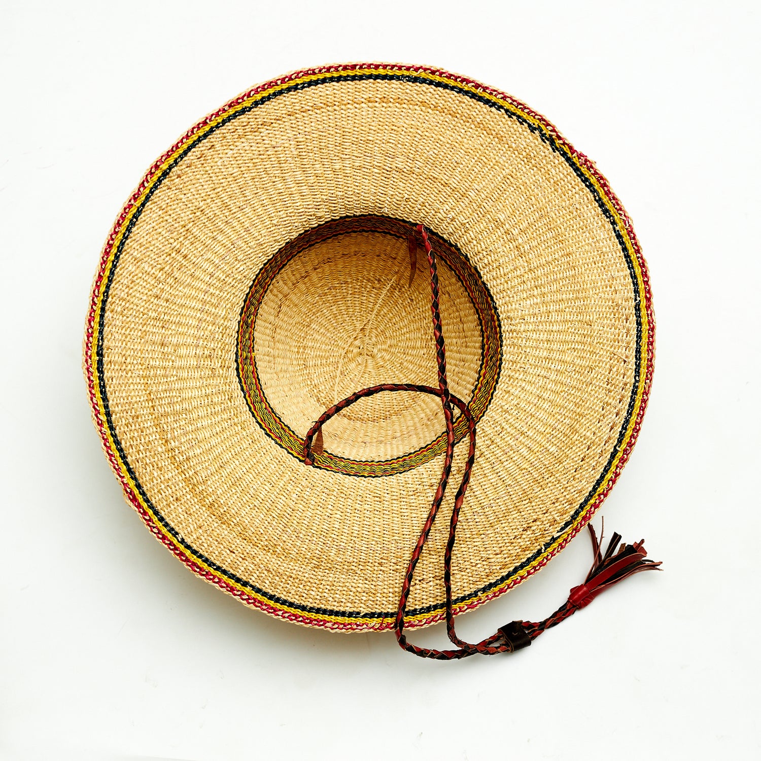 Natural Elephant Grass Handwoven Garden Hat Designed with Black, yellow and red colors,Made in the Northern part of Ghana-Bolgatanga.