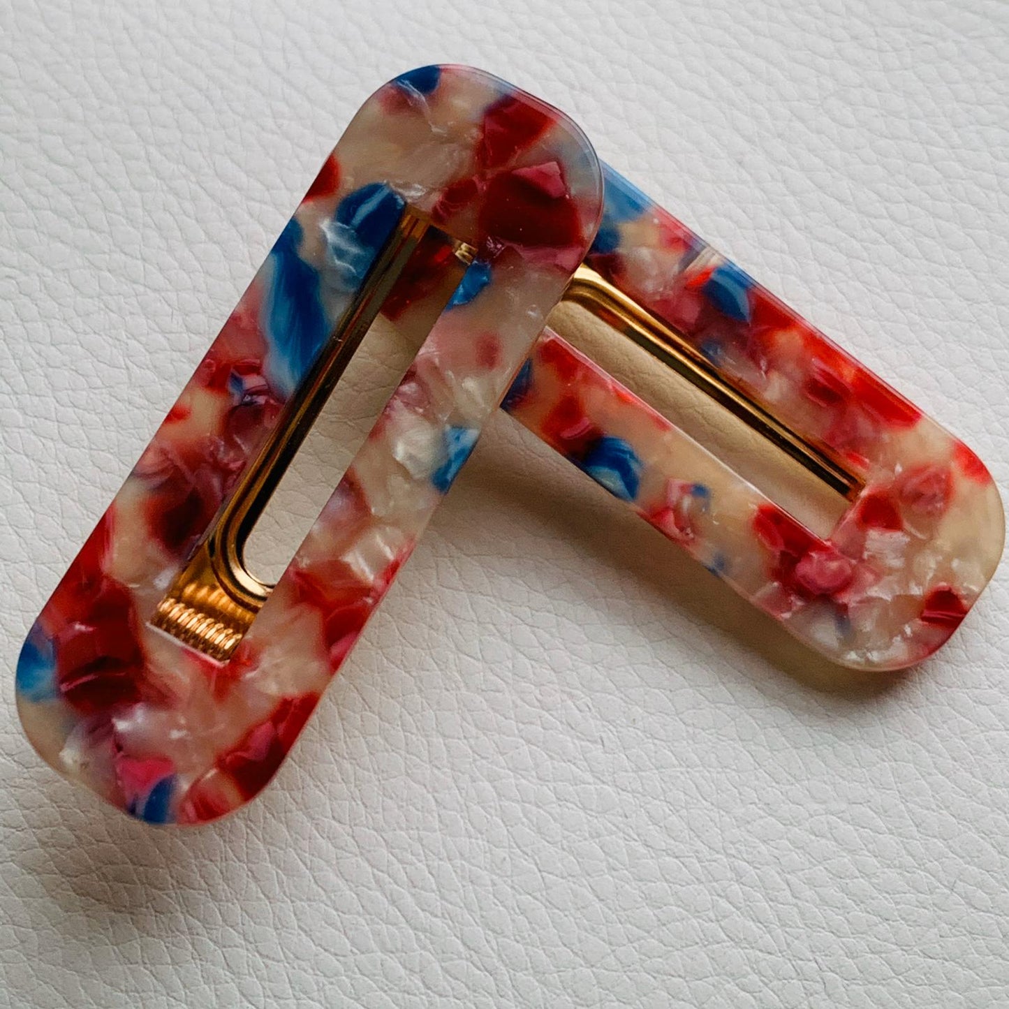 2 Piece Blue, Cream And Red No Slip Grip Curved Rectangle Hair Clips