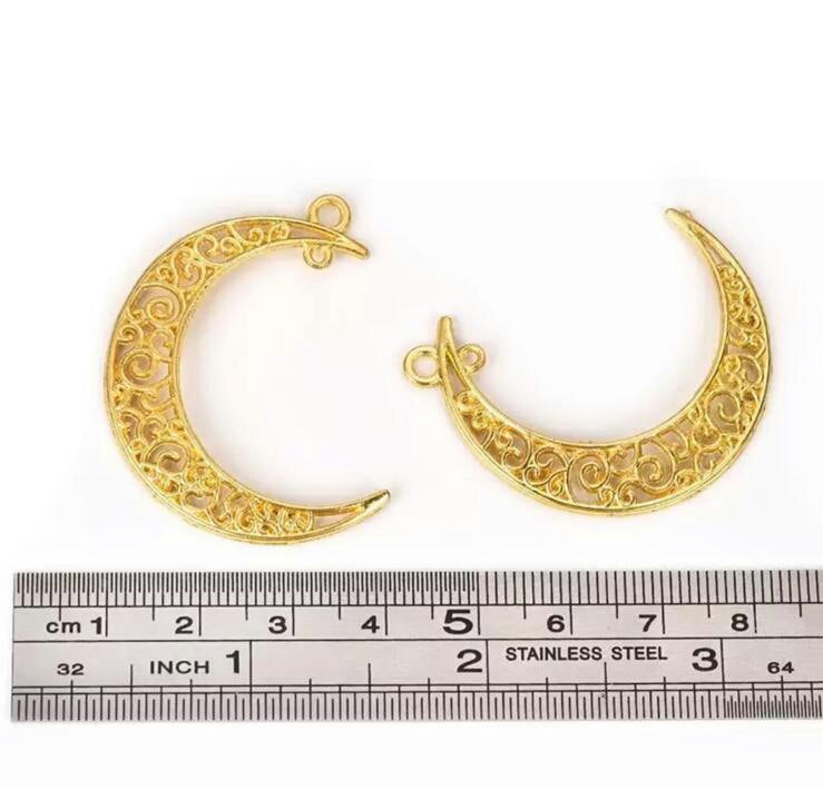 A Ruler Measuring 2 Gold Moon Style waist bead Charm
