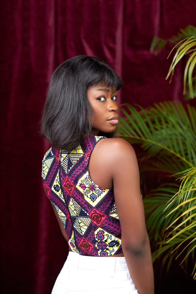 Ankara Pink, Yellow, Black And White Blend Coloured Sleeveless V Neck Crop Top with Back Zip
