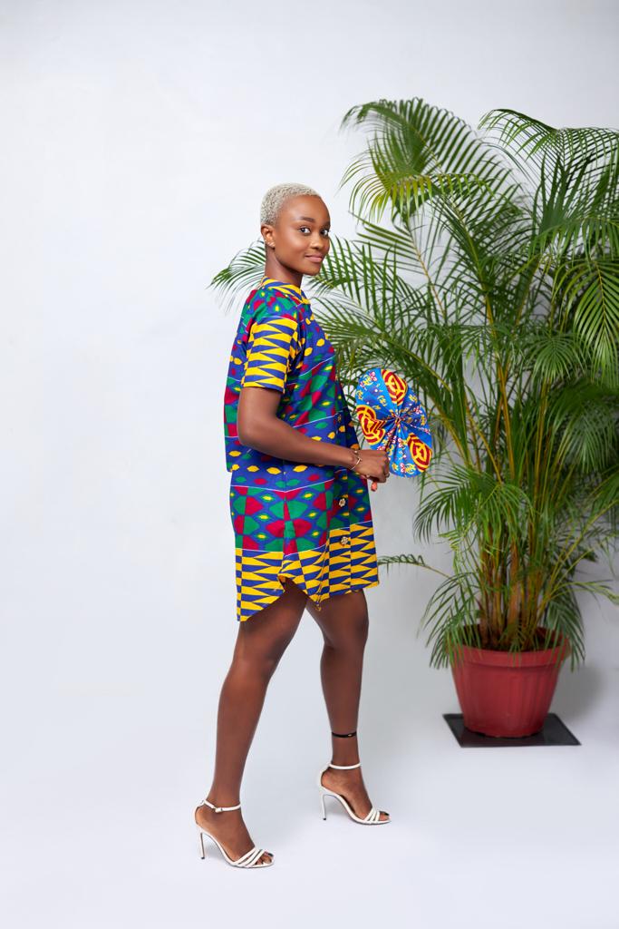 A Blend Of Blue, Yellow, Green , And Red Kente Print Button Shirt Mini Dress With Side Pockets