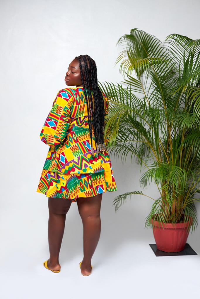 A Blend Of Yellow, Red, Purple, Blue And Green Kente Print V Neck Mid Puff Sleeve double Layered Midi Dress