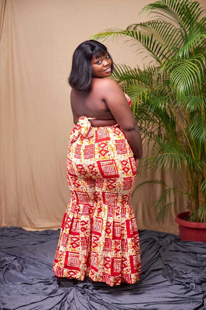 A blend of Red And Cream Ankara Print Stretchy Tube Back Tie Top With it Matching Stretchy Palazo Pant African Style
