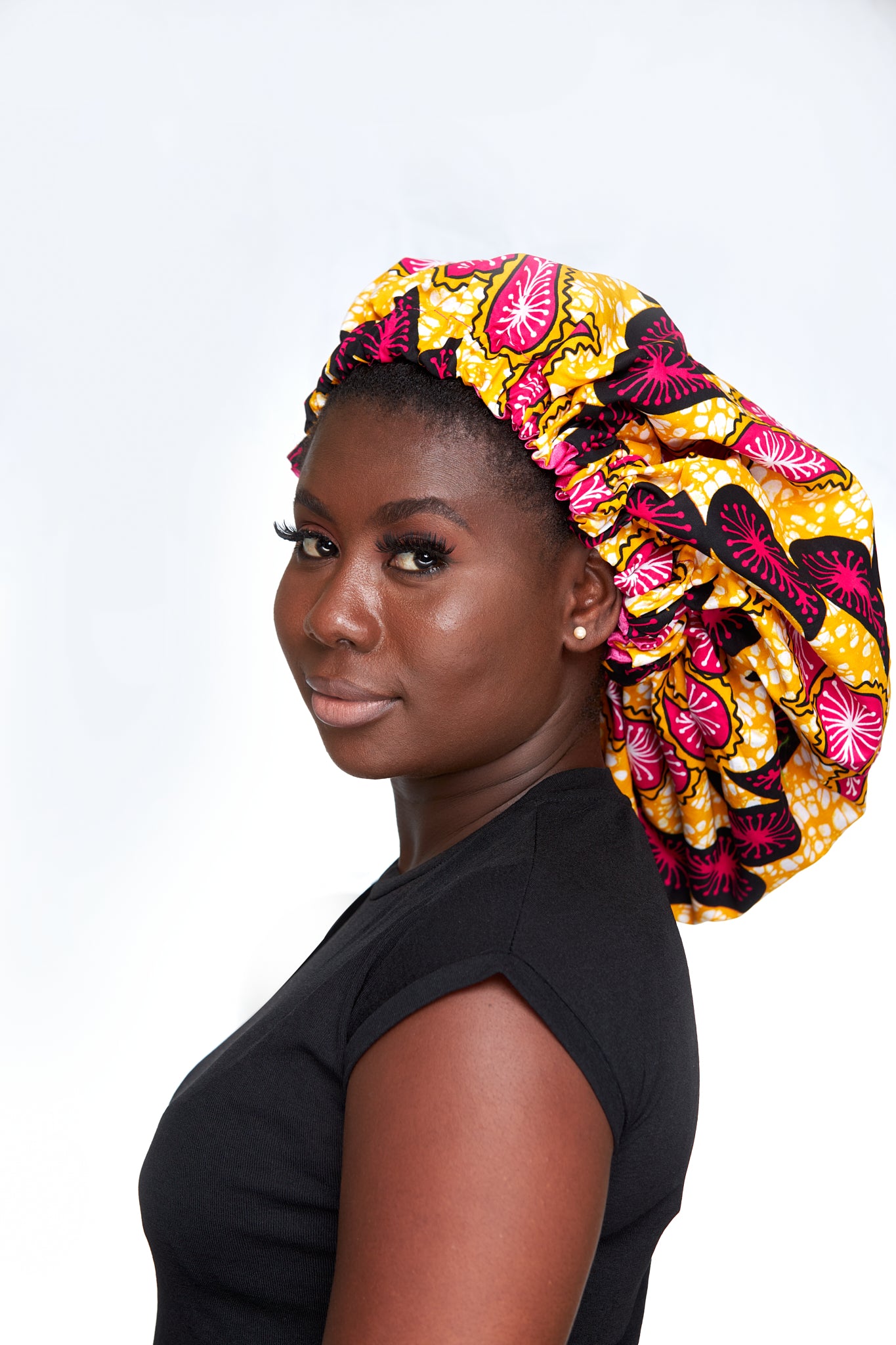 Yellow, White, Pink And black mix Pattern Ankara Print With Pink Silk Lined Hair Bonnet