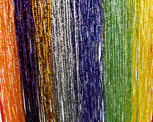 7 different types of waist beads including 52 Inches Green Tie On Waist Beads, 52 Inches Light Orange Shiny Crystal Tie On Waist beads, 53 Inches Yellow Shiny Crystal Tie On Waist beads, 52 Inches Silver Shiny Crystal Tie on Waist beads, 52 Inches Blue Shiny Crystal Tie On Waist beads, 53 Inches Gold Shiny Crystal Tie On Waist beads, And 52 Inches Purple Shiny Crystal Tie On Waist beads.