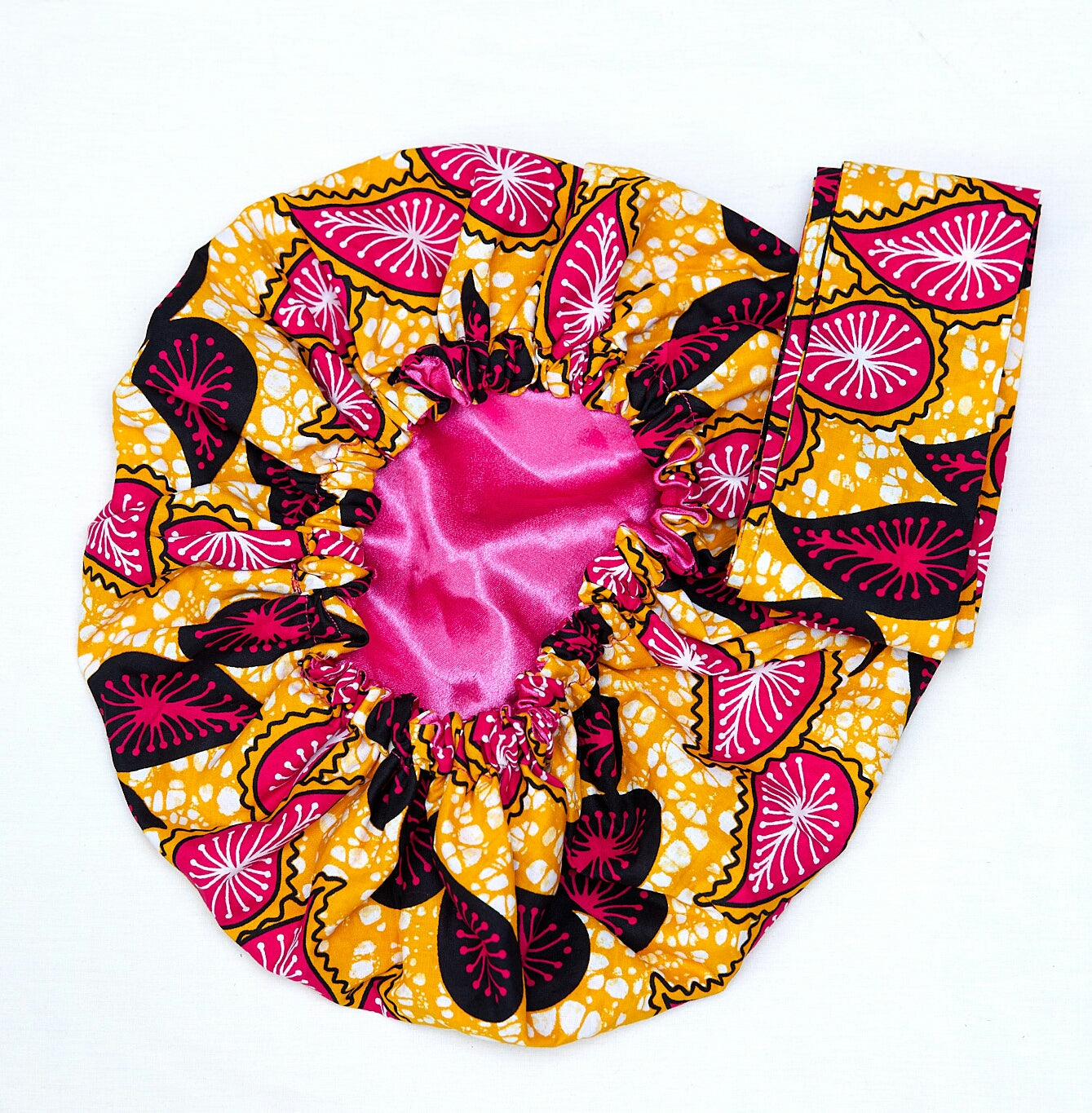 Ankara Wax Print Made of Gold, Pink and Black Blended Beautiful Colours And Pattern, Hand Made Elastic Silklined Bonnet With Band
