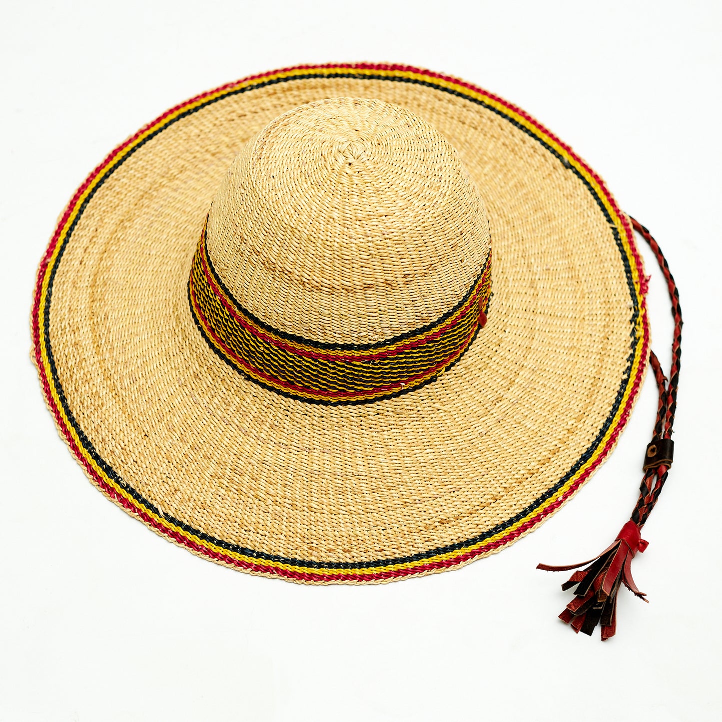 Natural Elephant Grass Handwoven Garden Hat Designed with Black, yellow and red colors,Made in the Northern part of Ghana-Bolgatanga.
