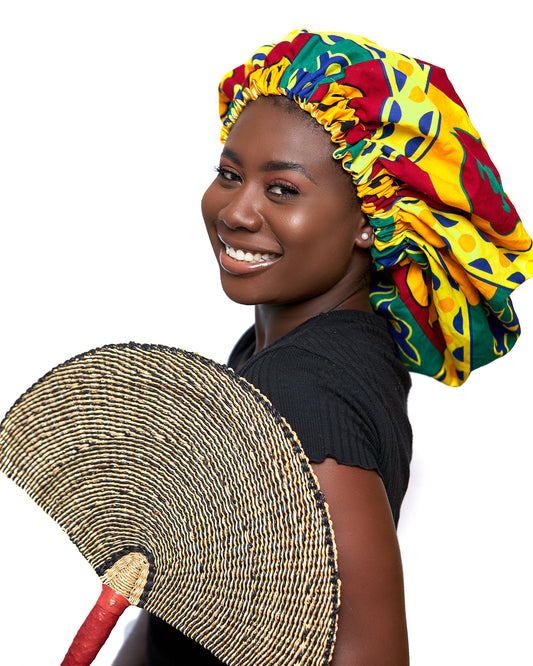 Ghanaian Kente Wax Print Made of Yellow, Green,Red and Blue  Blend of Beautiful Colours And Pattern With Adinkira Symbols, Hand Made Elastic With Yellow Silk lined Hair Bonnet