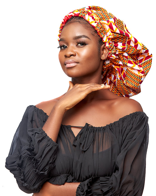 Ghanaian Kente Wax Print Made of Yellow,Red ,White and Blue Blend of Beautiful Colours And Pattern With Adinkira Symbols, Hand Made Elastic With Red Silk lined Hair Bonnet