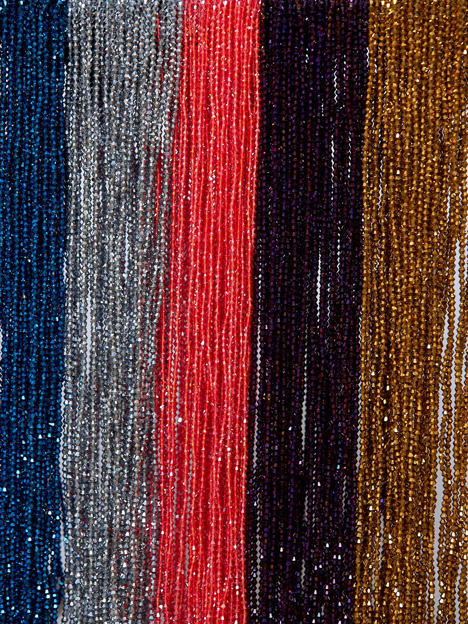 5 different types of waist beads including 52 Inches Orange Shiny Crystal Tie On Waist beads, 53 Inches Purple black Shiny Crystal Tie On Waist beads, 52 Inches Gold Shiny Crystal Tie On Waist beads, 53 Inches Silver Shiny Crystal Tie On Waist beads, And 52 Inches Blue Shiny Crystal Tie On Waist beads.