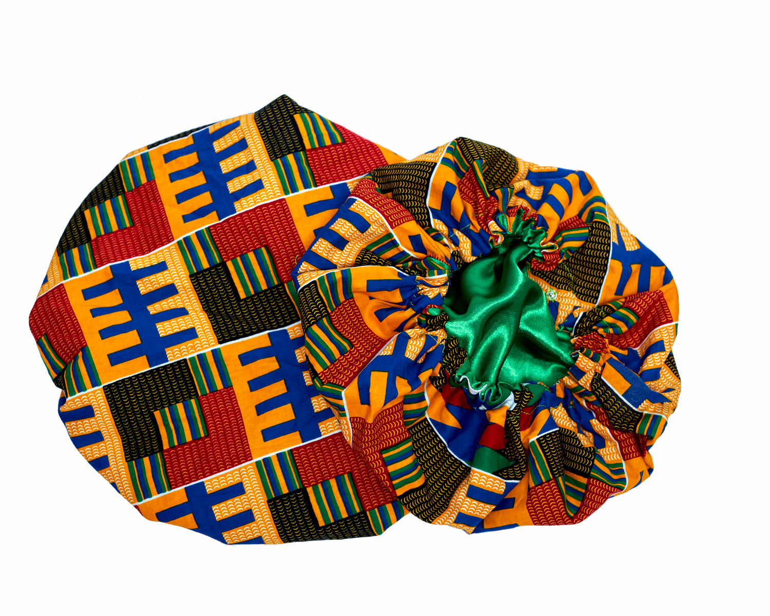 A Ghanaian Kente Wax Print Made of Yellow,Red,Blue, Green And White Blend of Beautiful Colours And Pattern, Hand Made Elastic With Green Silk lined Hair Bonnet