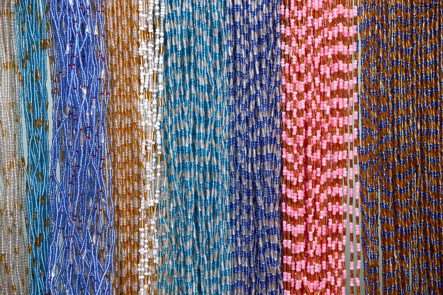 6 Different types of beads including 46 Inches Silver Glass Beads With Gold bars Tie on Waist Beads, 47 Inches Pink beads With gold bars Tie on Waist Beads, 42 Inches Blue beads with Gold bars tie on waist beads, 45 Inches Sea blue Glass beads With Silver Bars Tie On waist Beads, 46 Inches Blue beads with Silver bars tie on waist beads, 46 Inches Silver Blue And Red beads with Gold Bars tie on waist beads